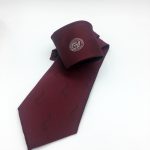 Custom made neckties with logo or crest for clubs, schools and companies in a custom tie design