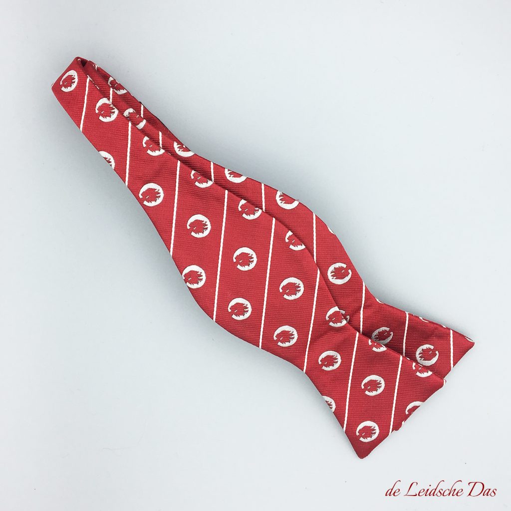 Self-tie and pre-tied bow ties with a logo made by design & custom-designed ties with logo
