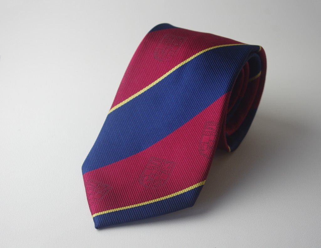 Specially-made to order classic custom ties with crests, stripes and lines, custom woven ties