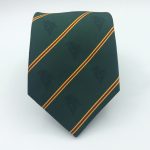 Striped green tie with repeating logos woven in a custom made tie design