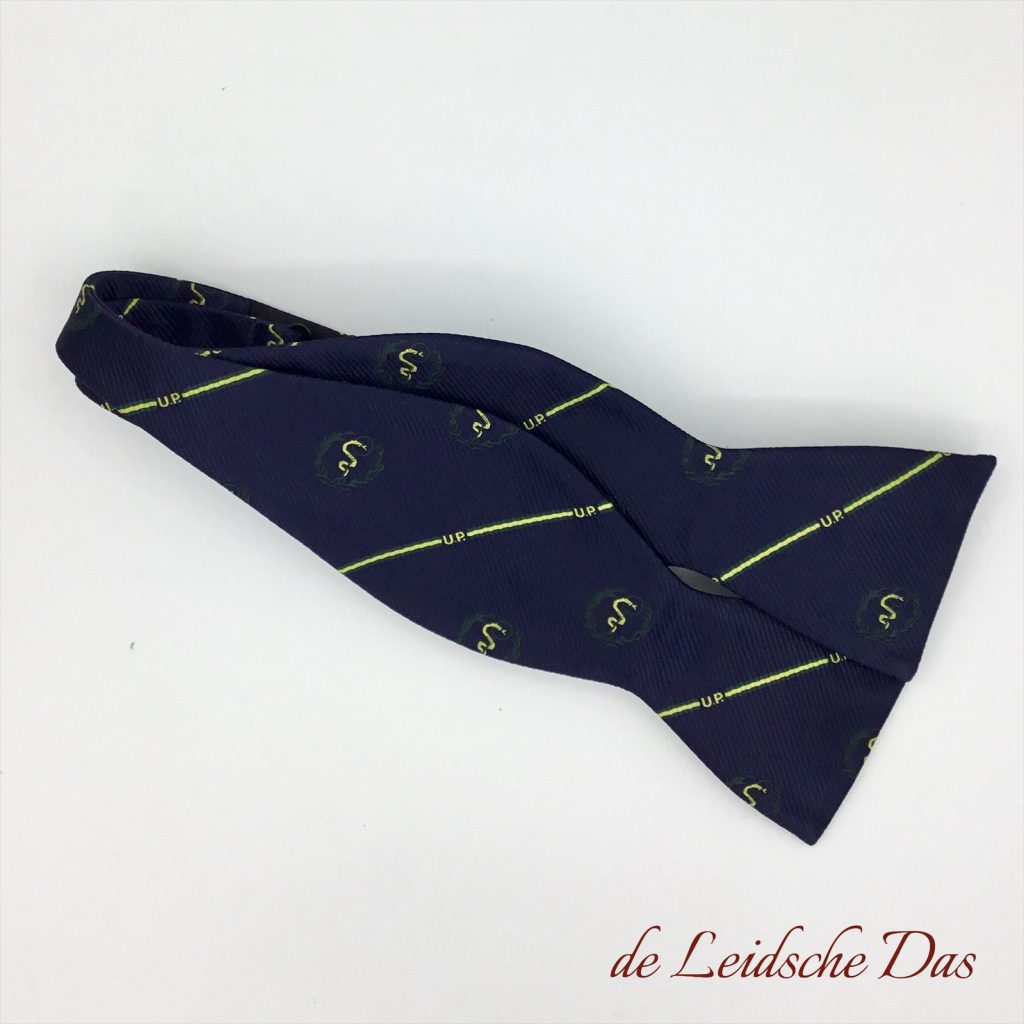 Self-tie bespoke society bowtie with crests, custom weaved fabric