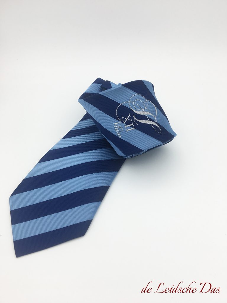 Custom weaved classic striped ties in blue shades with a centered logo, logo ties in custom made tie designs
