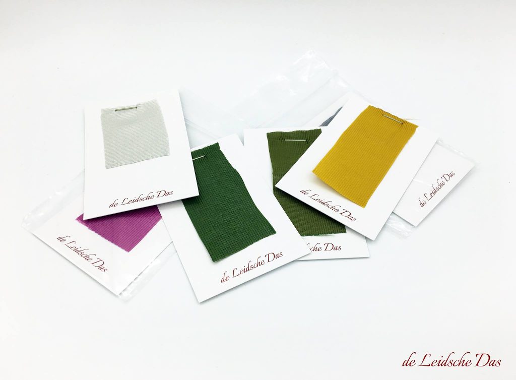 Samples of fabric colors for custom weaved ties, personalized ties with a crest, logo or coat of arms