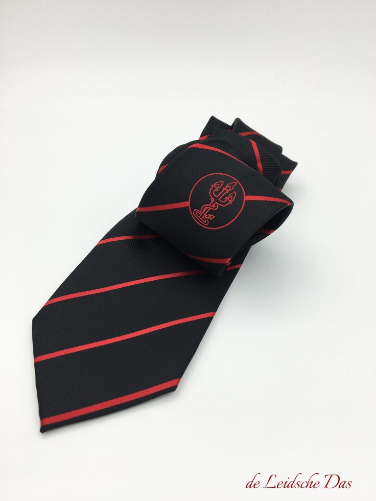 Black customized tie, custom woven personalized tie in black with red lines and centered confraternity logo