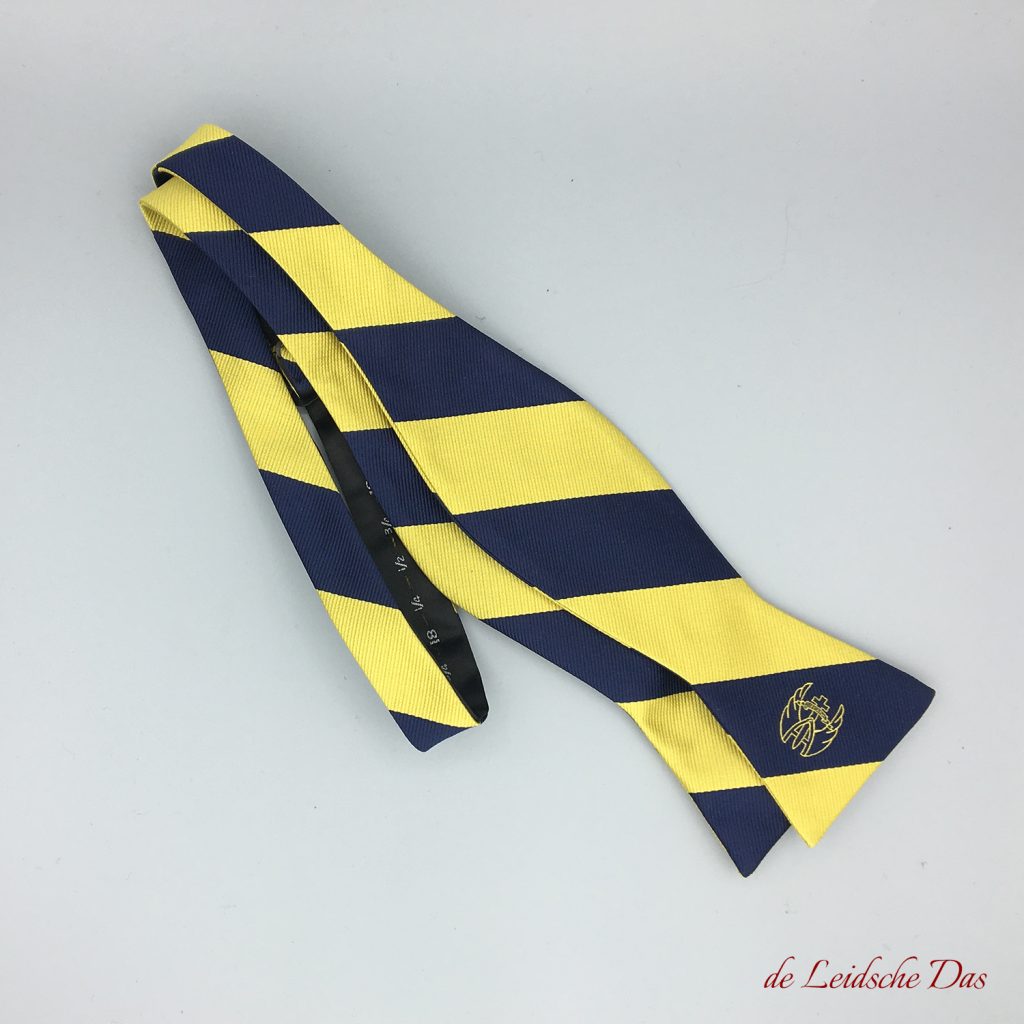 Yellow and blue striped personalized self-tie bowtie with a logo, tailor-made ties self-tied bowties in a custom made bow tie design