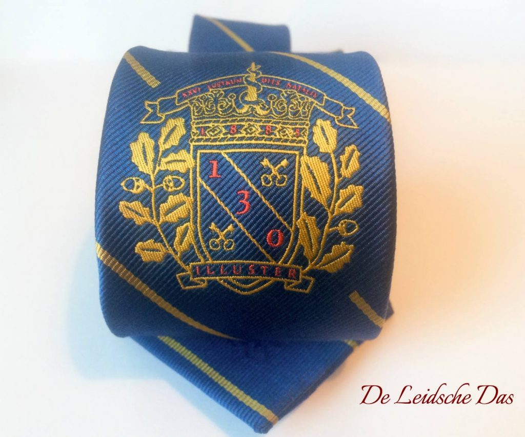 Custom silk tie with a crest - custom repp woven silk ties made in a custom design to order