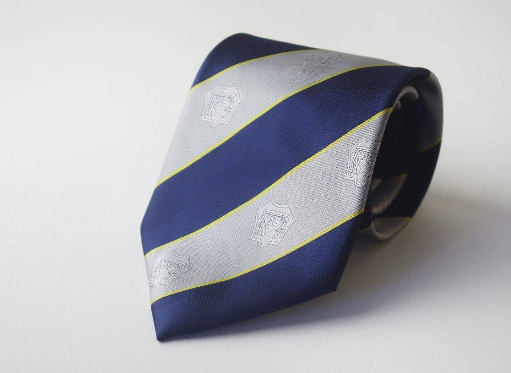 Tailor-made striped club tie in club colors, tie fabric custom woven in an exclusive club tie design with recurring subtly positioned club logos