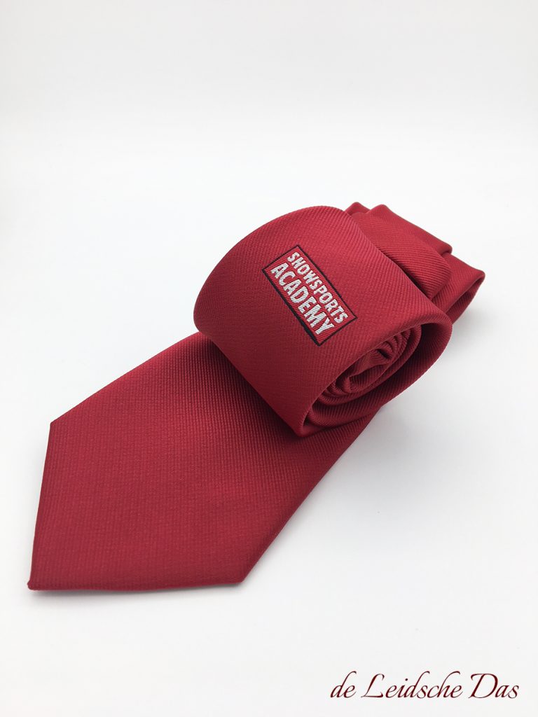 Necktie made custom in a solid color with logo, custom weaved personalized neckties for companies and clubs